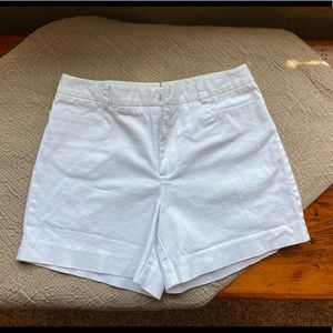 White Mid-rise Limited brand shorts.